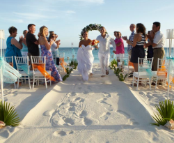 Bride and groom at beach wedding