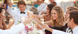 Wedding guests celebrating with a toast